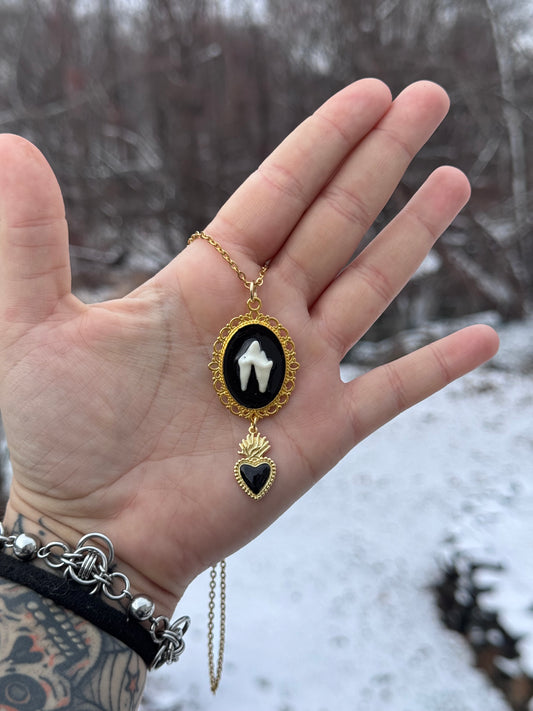 Coyote Molar Black Heart Necklace