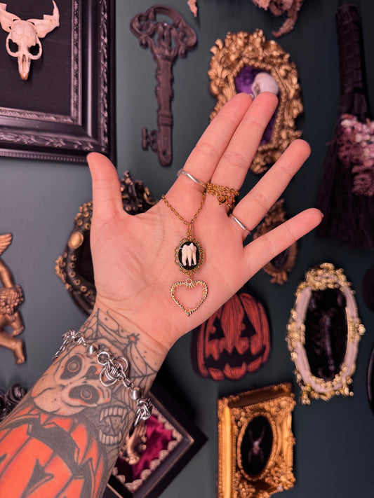 Raccoon Tooth Spiked Heart Necklace