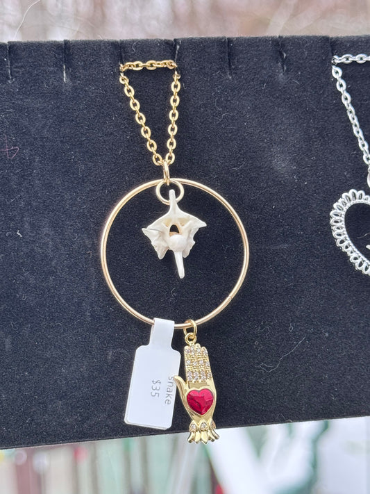 Gold Hand Vertebrae Necklace