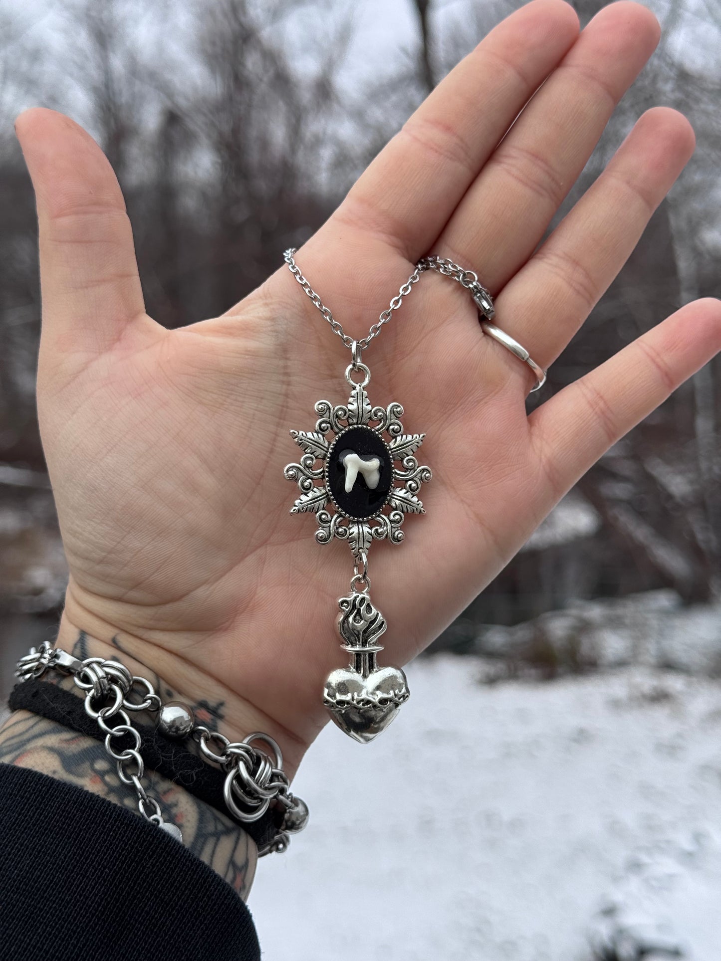 Raccoon Molar Sacred Heart Necklace