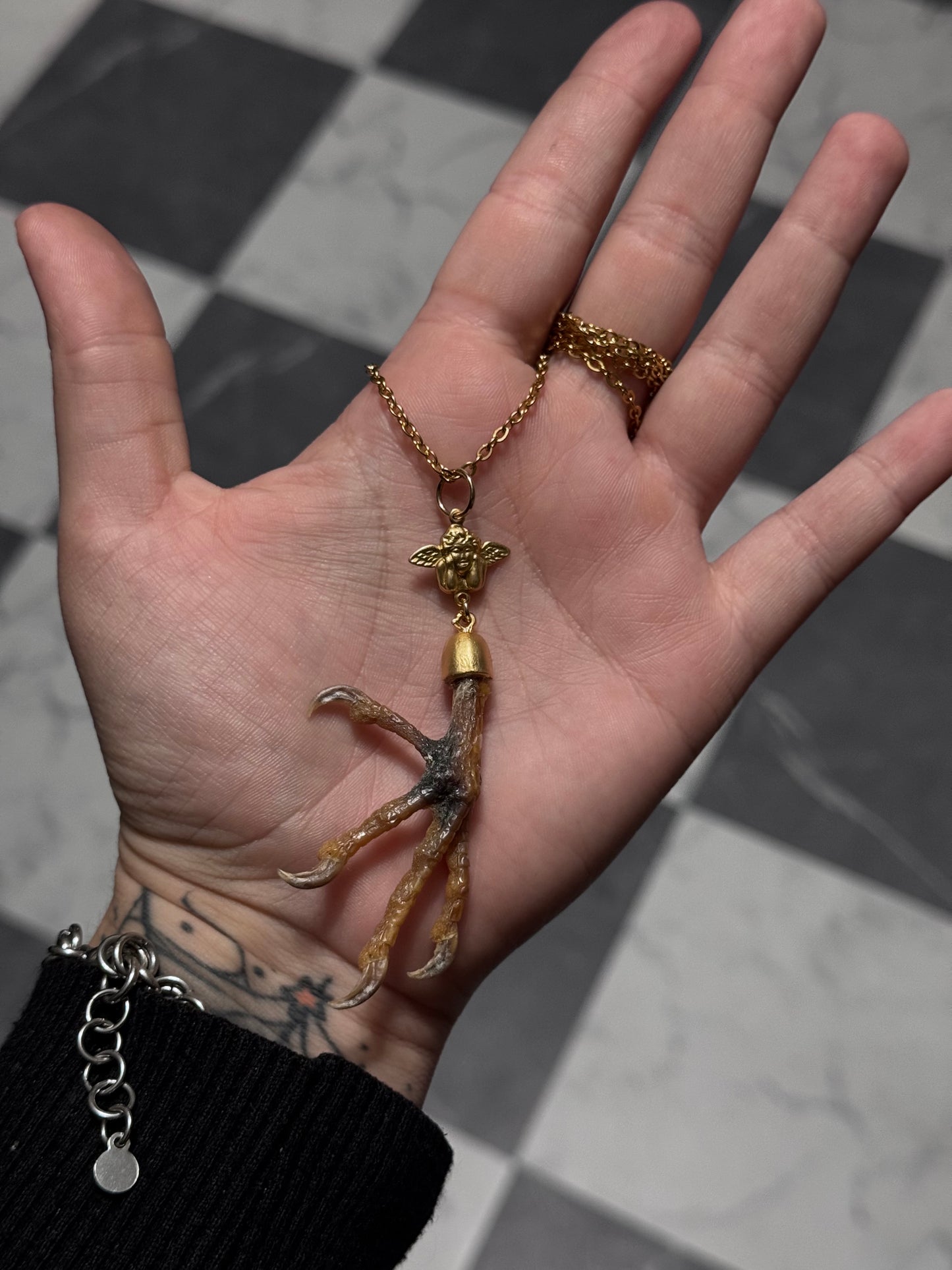 Cherub Pigeon Claw Necklace