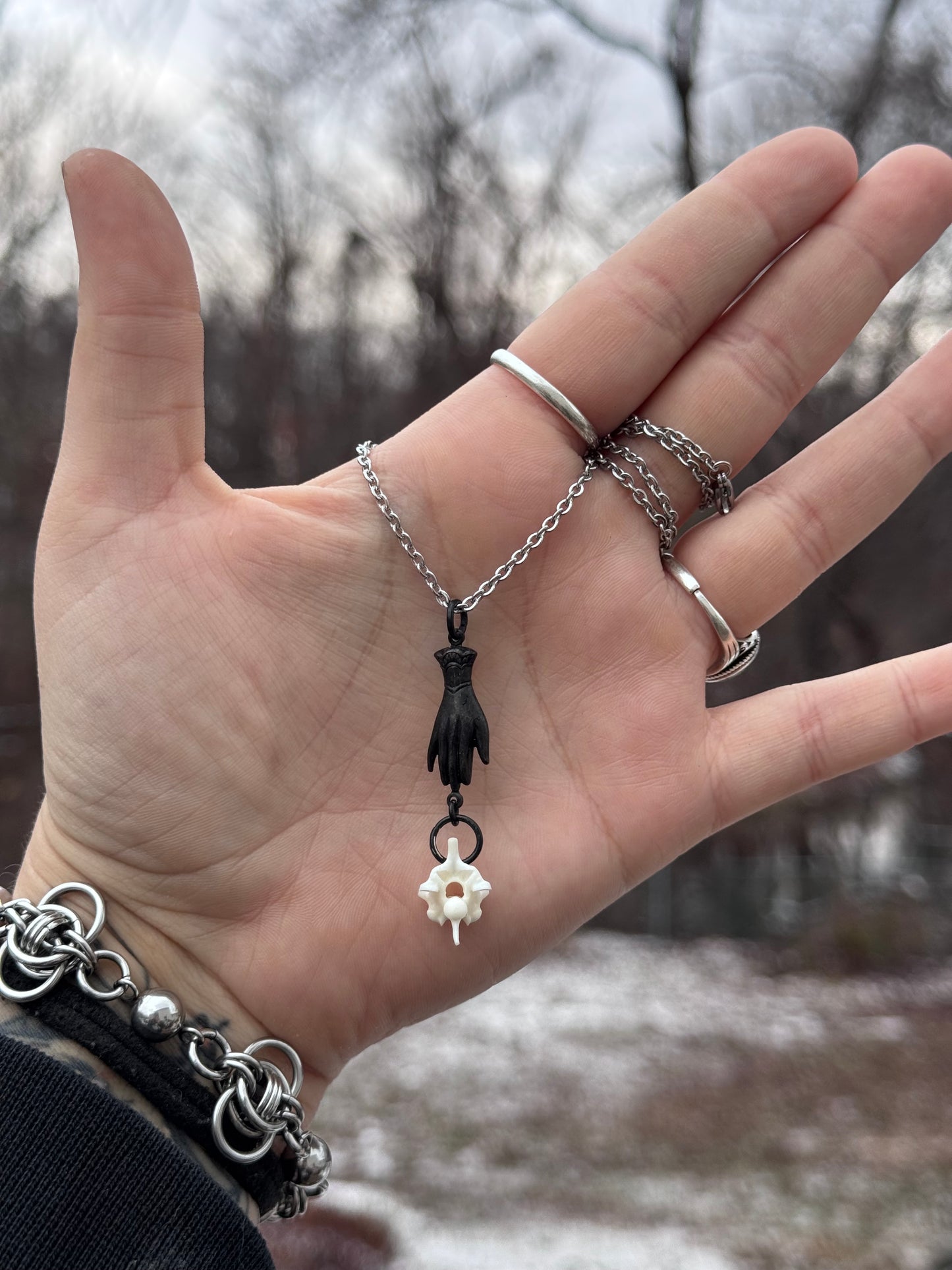 Black Hand Vertebrae Necklace